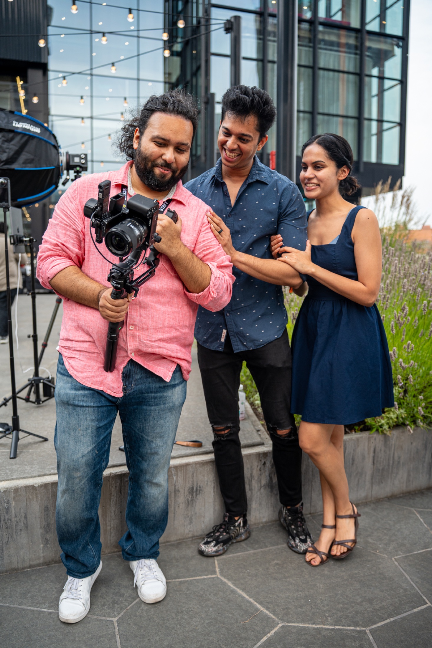 Dennis Dey holding a camera on a gimbal during a shoot