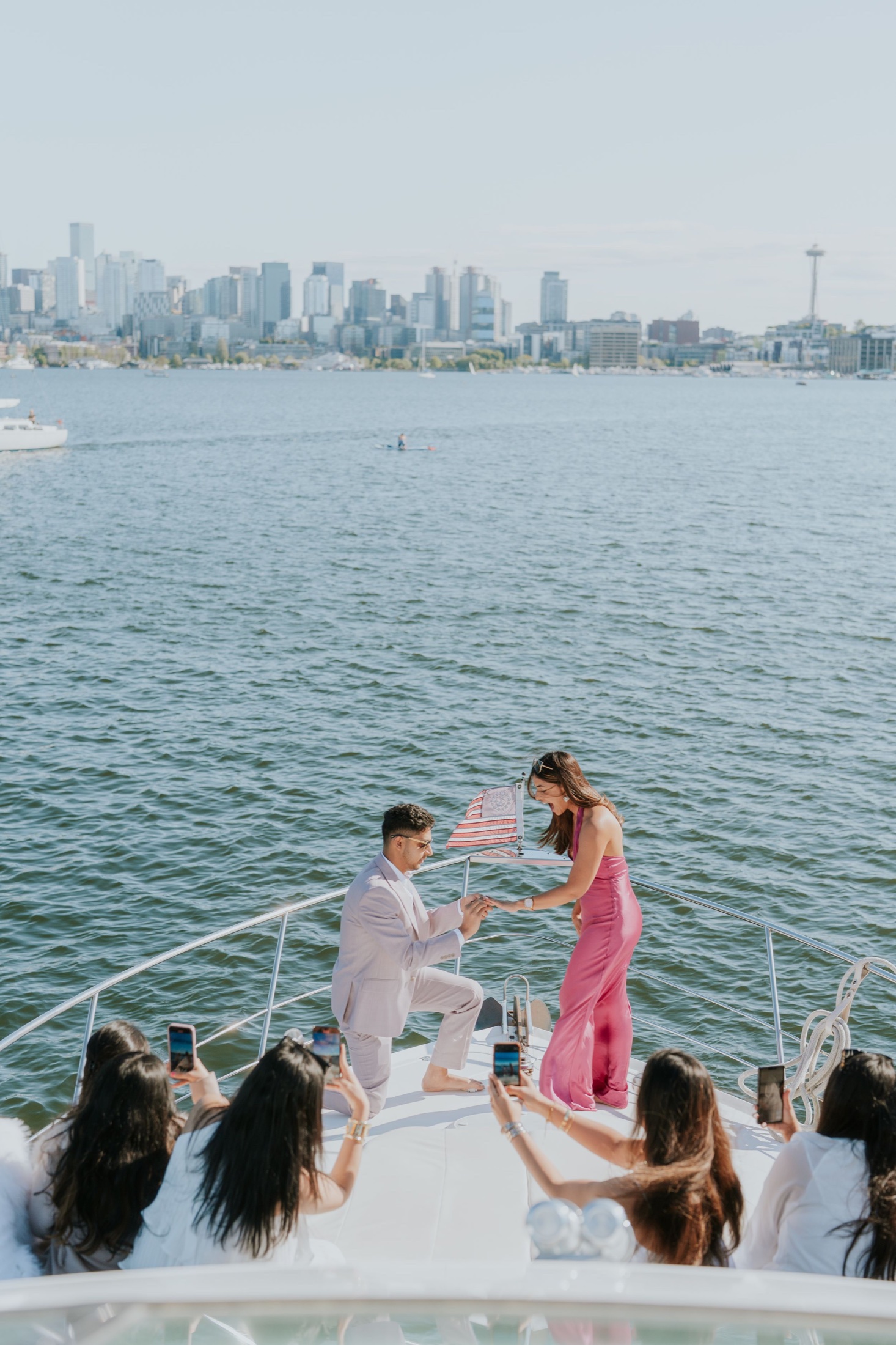 Proposal on a boat with Seattle behind